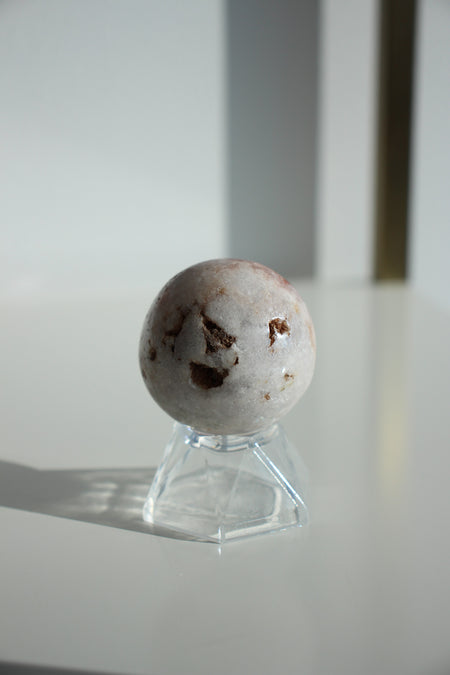 White and pink mini amethyst sphere with shimmering white druzy points