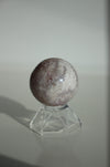 Shimmering purple and white mini amethyst sphere with sparkling crystal points