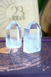 Two Clear Quartz mini towers sit in front of a 23 Urban branded jute bag 