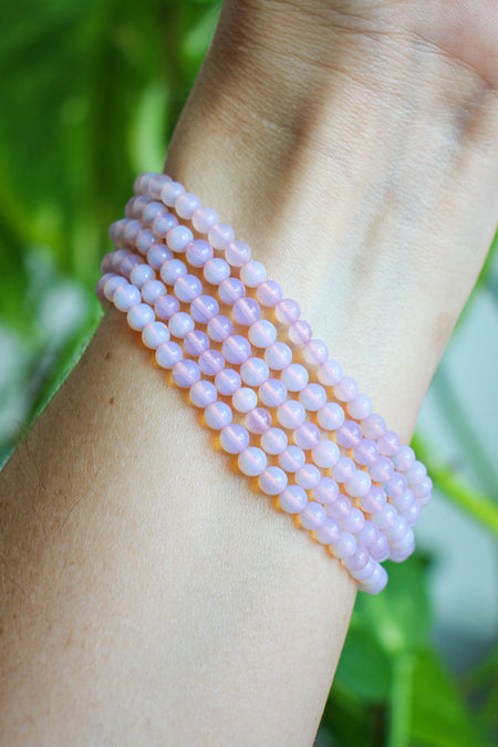 A stack of 5 pink opalite bracelets. Dubai crystals. 23 Urban