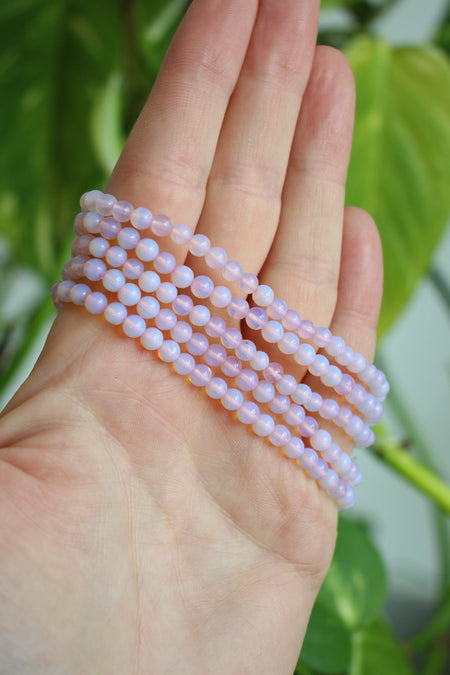 A stack of 5 pink opalite bracelets. Dubai crystals. 23 Urban