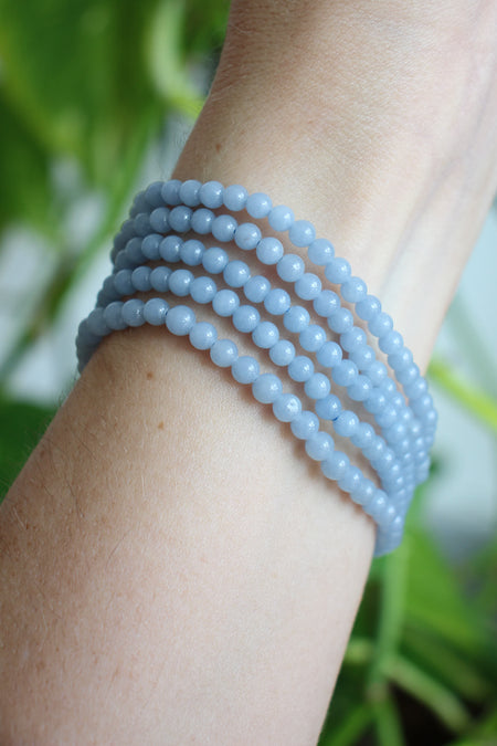 A stack of 5 beautiful pale blue Angelite bracelets. Dubai Crystals. 23 Urban.