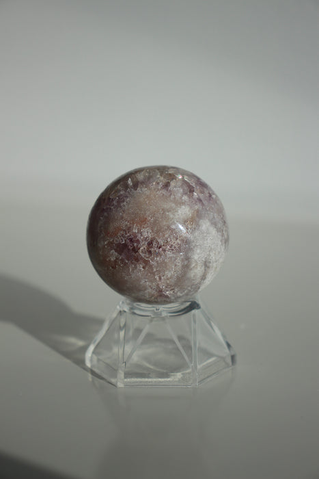 Shimmering purple and white mini amethyst sphere with sparkling crystal points