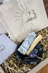 Cleansing Kit from 23 Urban, containing White Sage, Palo Santo, Clear Quartz, Amethyst and a Black Marble Fossil Bowl. 