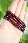 A stack of 5 beautiful deep red garnet bracelets with a delicate small bead size. Dubai Crystals. 23 Urban.