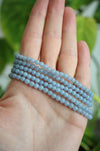 A stack of 5 beautiful pale blue Angelite bracelets. Dubai Crystals. 23 Urban.