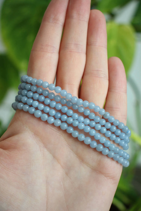 A stack of 5 beautiful pale blue Angelite bracelets. Dubai Crystals. 23 Urban.