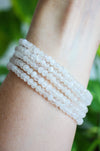 Delicate faceted Moonstone bracelets stacked on a wrist. 23 Urban. 